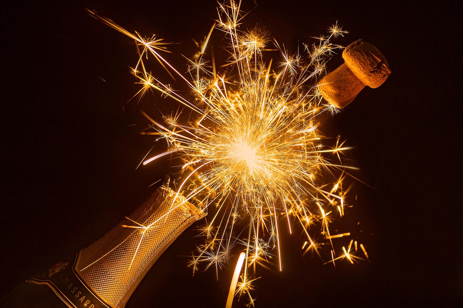 Guests with sparklers celebrating New Year's Eve