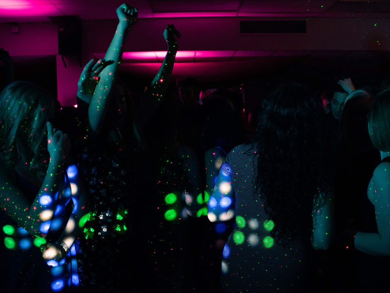 Guests dancing on a crowded dance floor