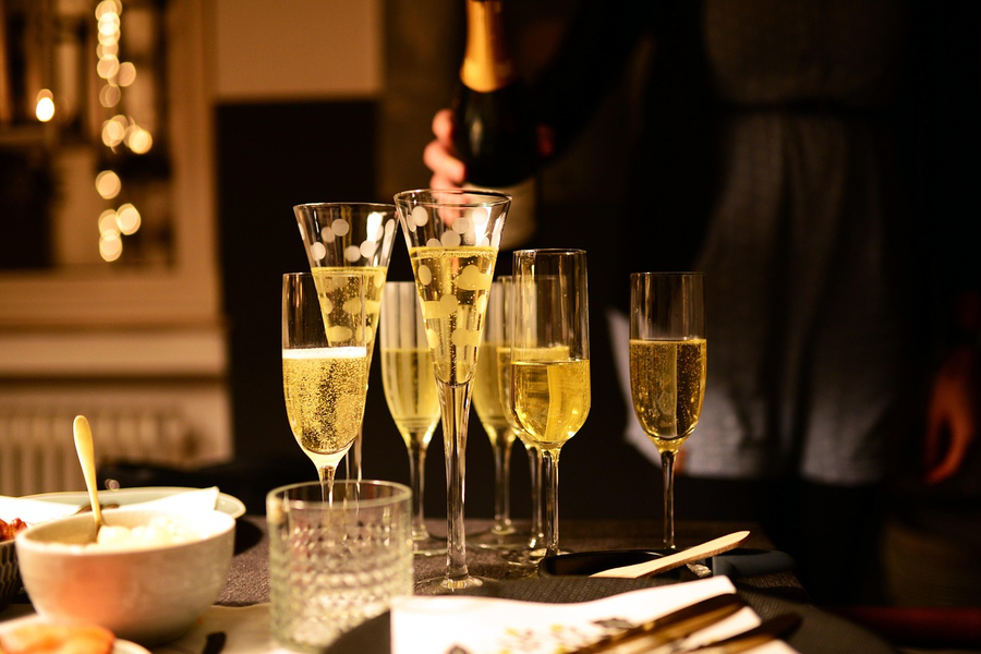 Friends raising a toast at an elegant private dinner party