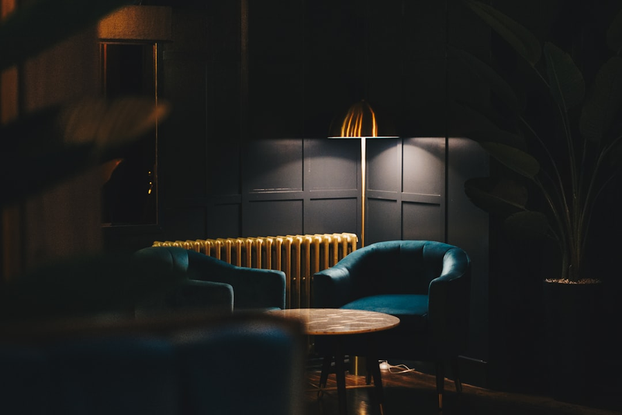 Luxurious lounge interior with dark and gold tones